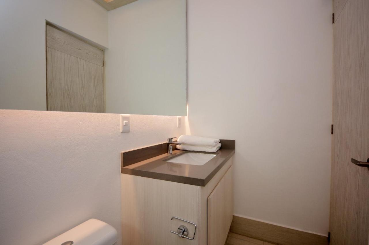 Mayan Monk Suites Плая-дель-Кармен Экстерьер фото
