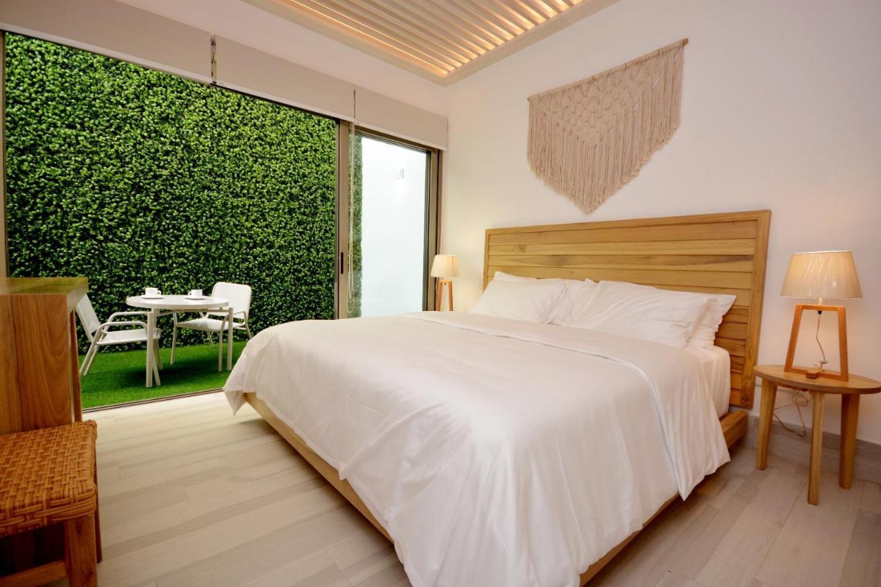 Mayan Monk Suites Плая-дель-Кармен Экстерьер фото
